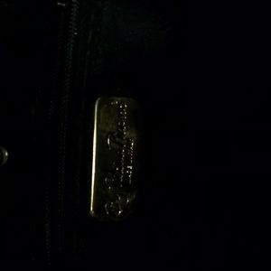 Paloma Picasso adjustable shoulder bag.Made in Italy